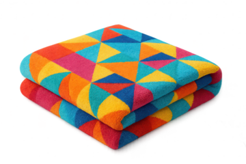 Folded colorful geometric patterned towel isolated on a transparent background.