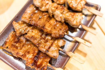 Japanese yakitori grilling on skewers a culinary delight on plate delicious