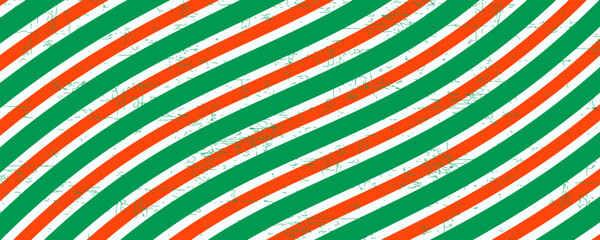 Christmas seamless pattern. Red and green diagonal stripes background. Candy cane repeating decoration wallpaper. Winter holiday lines backdrop. Xmas peppermint present wrapping print design. Vector