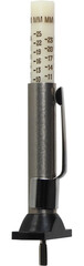 Tire tread depth gauge on white background