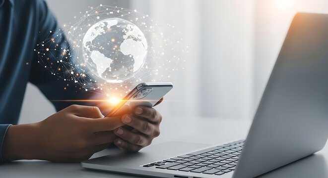 Man using smartphone with global network connection and laptop on desk concept of global business and technology