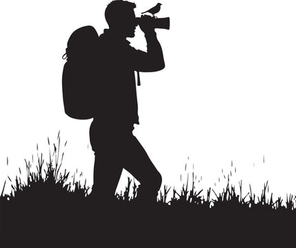 Black silhouette of man with backpack and camera with bird on lens