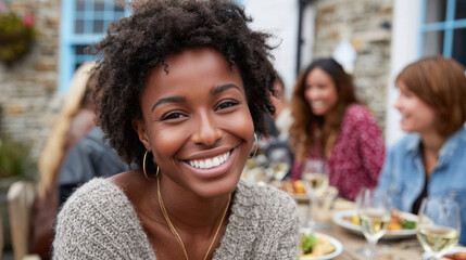 Happy together, A diverse group of young adults enjoying lunch together in a casual setting.