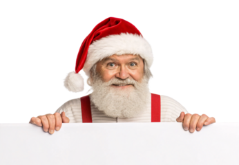 Santa Claus with white beard holding blank sign, wearing traditional hat and suspenders, isolated on a transparent background