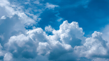 Blue sky texture features cumulus clouds. Great for social media, posters, presentation backgrounds.