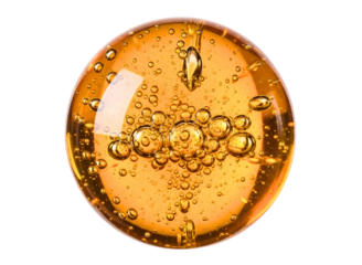 Closeup of amber liquid with bubbles isolated on transparent background