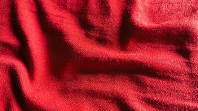 Textured red fabric folds