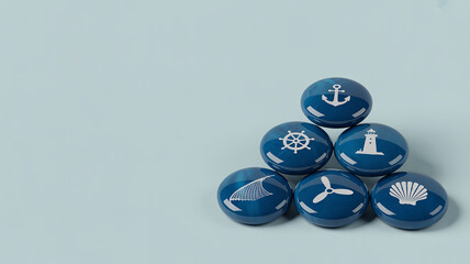 Round blue objects with nautical icons stacked in a pyramid, representing sea and travel