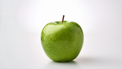 Single Green Apple On A Plain White Background