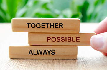 Together possible always text on wooden blocks.