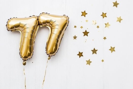 Elegant golden 77 balloons with sparkling stars on white background for celebration themes