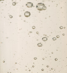 shampoo, cleanser, macro texture of oil with bubbles, cosmetic textures, skincare product liquid
