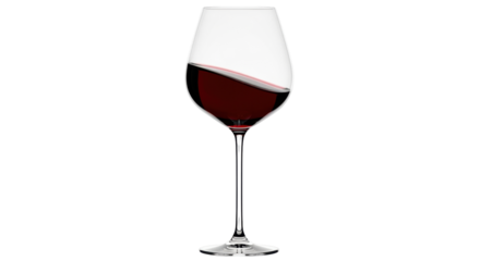 Isolated glass of red wine sitting on a surface, viewed from the front at eye level shot
