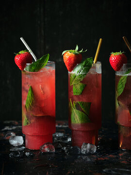 Fresh Strawberry Cocktails with Basil and Ice in Tall Glasses