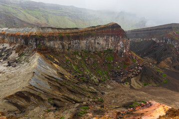 The Nakadake crater is a larger active crater of the Mount Aso volcano allowing impressive views into the volcano and the surrounding nature, Kumamoto, Japan