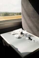 Insulin and diabetes infusion set supplies on train table during travel