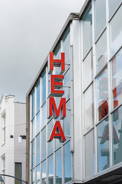 vertical hema sign on a retail building exterior - Deventer, Netherlands - 2025-09-25