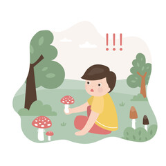 Kid want eating poisonous mushroom. Boy sitting in summer grass meadow and holding fly agaric with red cap to eat, poison in food and danger