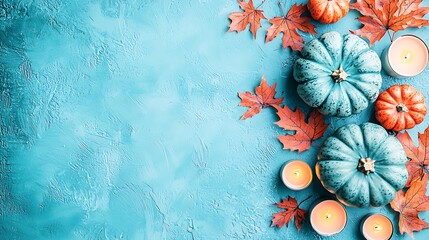 Autumn harvest flat lay featuring pumpkins, maple leaves, and glowing candle shadows