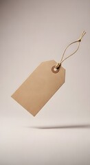 A blank beige paper tag with a string looped through a metal eyelet, set against a plain background, often used for labeling or gift tagging purposes