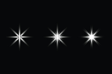 Set of starburst light effects lens flare vector design elements isolated on black background