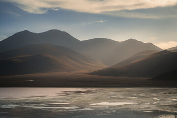 Sunset over the bolivian mountains and the laguna colorada