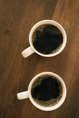 Two cups of coffee on the table