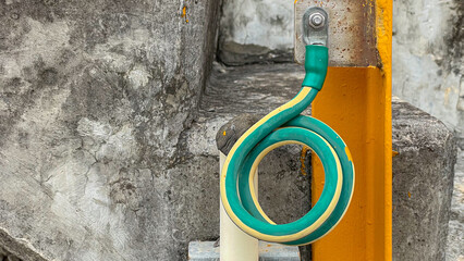 Grounding cable connected to a steel structure with the other end buried in the ground,