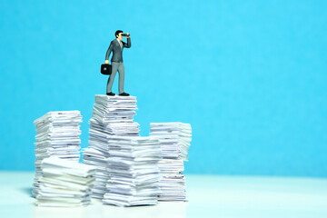 Project task observation concept illustration. Businessmen using binocular standing above file pile.