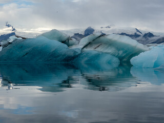 Icebergs floating in Iceland's Jokulsarlon Glacier Lagoon in early morning