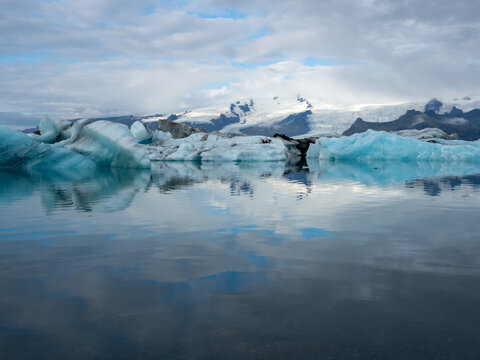Icebergs floating in Iceland's Jokulsarlon Glacier Lagoon in early morning