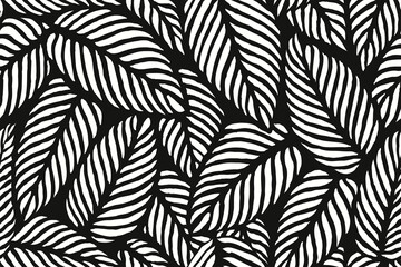 Seamless black and white leaf pattern with bold abstract foliage shapes creating a modern botanical background design, decorative minimalist tropical leaves illustration for fabric and wallpaper.