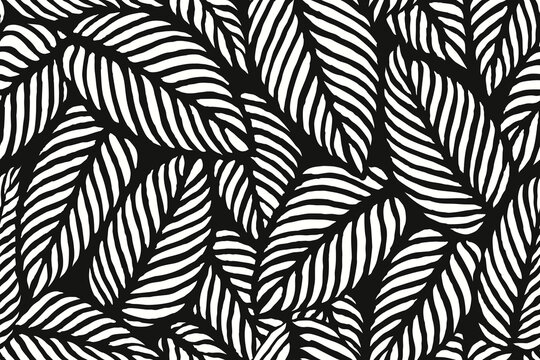 Seamless black and white leaf pattern with bold abstract foliage shapes creating a modern botanical background design, decorative minimalist tropical leaves illustration for fabric and wallpaper.