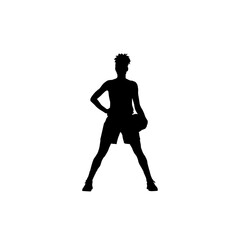 Silhouette of a young basketball player holding a ball with one hand on hip