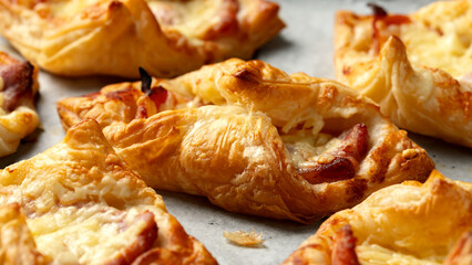 Cheese Bacon Turnovers pastry on baking paper