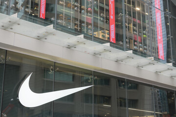 Fototapeta premium exterior building facade and sign of Nike Bloor, a sportswear store, located at 23 Bloor St E, Toronto
