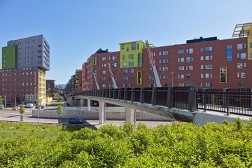 Sähköttäjänsilta bridge is a pedestrian and cycling bridge in Helsinki on the border of Vallila and Itä-Pasila, passes over the busy Teollisuuskatu street, Helsinki, Finland.