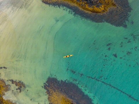 Aerial View of Kayaker in Turquoise Shallow Water