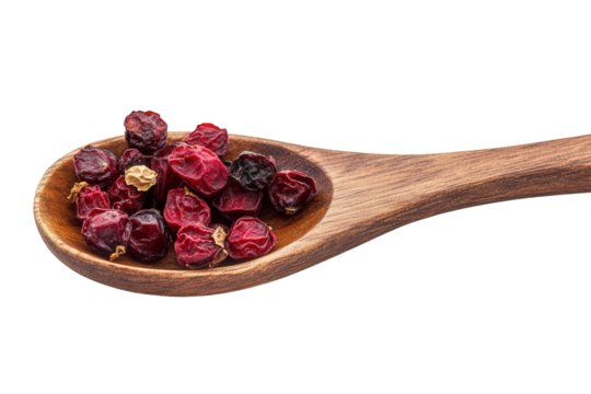 Wooden spoon filled with dried rosehips, isolated on transparent background, highlighting their wrinkled texture and deep red color, perfect for herbal remedies