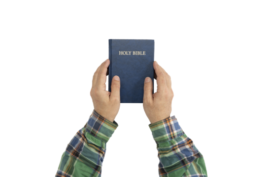 Hands holding Holy Bible book. Sacred scripture. Isolated background