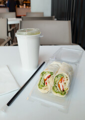 fresh Vegetable Wrap and Drink on Cafe Table
