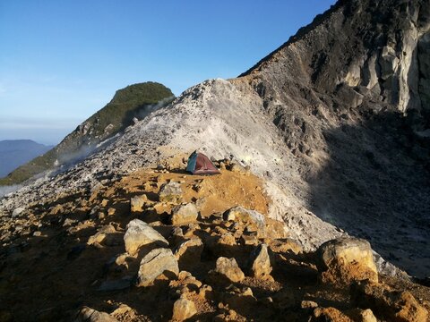 hiker on the top of mountain