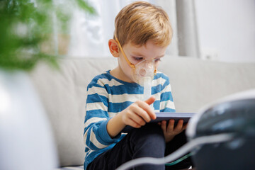Child Using Nebulizer While Engaged with Tablet at Home