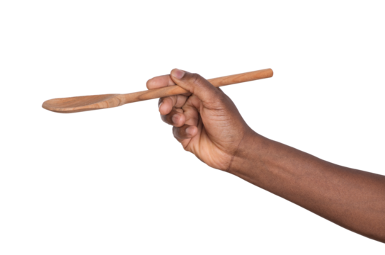 Hand holding a wooden spoon isolated on white or transparent background 