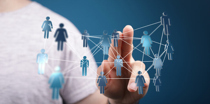 Hand touching a network of connected humans, representing social networking, global communication and business. - Powered by Adobe