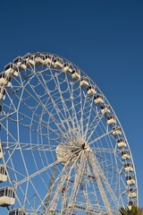 Ferris wheel. Observation. Ferris wheel with cabins for visitors. Attraction for viewing city from height. Gran Canaria. Canary Islands