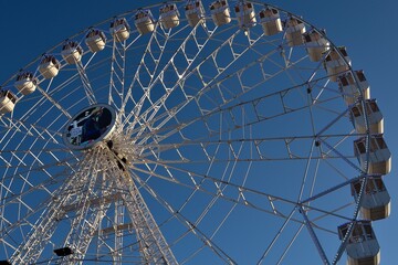 Ferris wheel. Observation. Ferris wheel with cabins for visitors. Attraction for viewing city from height. Gran Canaria. Canary Islands