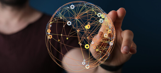 Person's hand touching a digital sphere with connected points. Concept of global network, communication and connectivity. Ideal for t