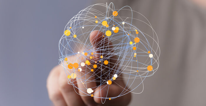 Hand touching a sphere of connected dots and lines representing globalization and the digital world with data connections and technol