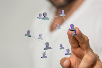 Conceptual image representing networking, connection, and communication. A hand holding a 3d...